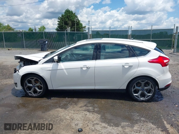 2016 Ford Focus Titanium with VIN 1FADP3N21GL309340, listed as a IAAI auction lot 42518653 with 101,555 mi miles and . Bid and sale history available at DreamBid. Image 14.