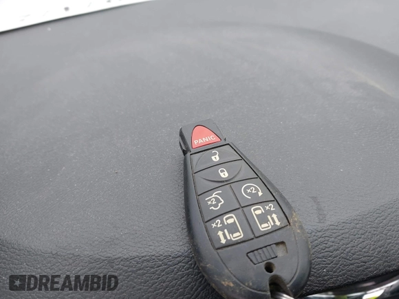 2019 Dodge Grand Caravan SXT with VIN 2C4RDGCG1KR580039, listed as a IAAI auction lot 41997472 with 163,915 mi miles and . Bid and sale history available at DreamBid. Image 11.