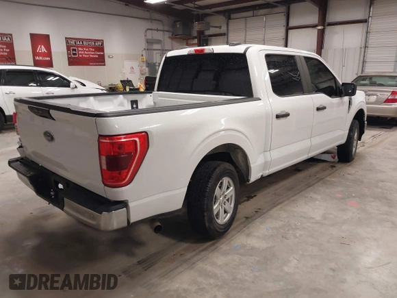 2021 Ford F-150 XL with VIN 1FTEW1C57MFA71572, listed as a IAAI auction lot 41549588 with 82,389 mi miles and . Bid and sale history available at carsss.com. Image 4.