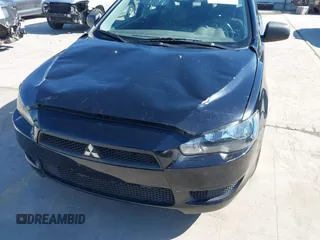 2010 Mitsubishi Lancer DE with VIN JA32U1FU1AU030470, listed as a IAAI auction lot 41389604 with 78,990 mi miles. Bid and sale history available at carsss.com. Image 6.