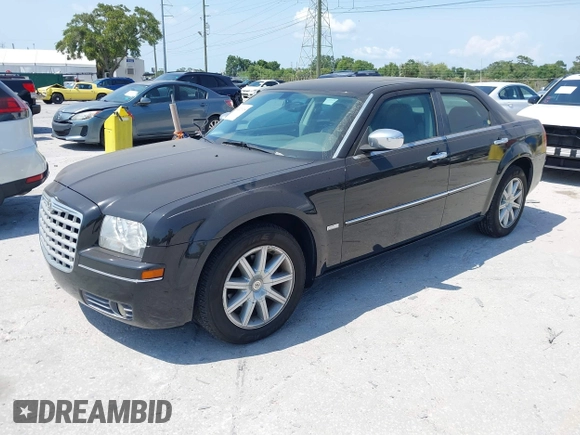 2010 Chrysler 300 Touring with VIN 2C3CA5CV7AH284713, listed as a IAAI auction lot 42221918 with 121,389 mi miles and . Bid and sale history available at DreamBid. Image 2.