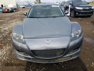 2005 Mazda RX-8 with VIN JM1FE173050145886, listed as a Copart auction lot 71110404 with 66,894 mi miles and Salvage Title. Bid and sale history available at carsss.com. Image 5.