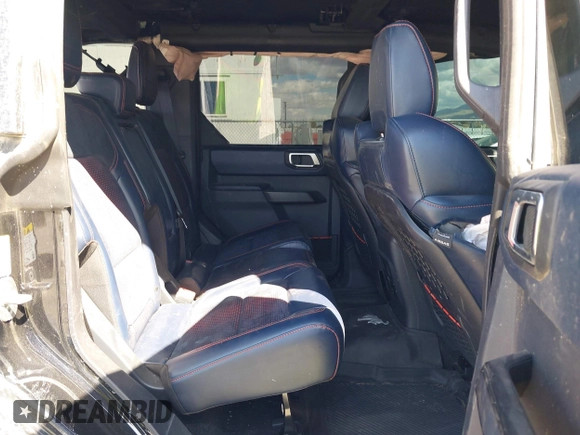 2023 Ford Bronco Raptor with VIN 1FMEE5JR8PLC06060, listed as a IAAI auction lot 41936950 with 13,623 mi miles and . Bid and sale history available at DreamBid. Image 8.