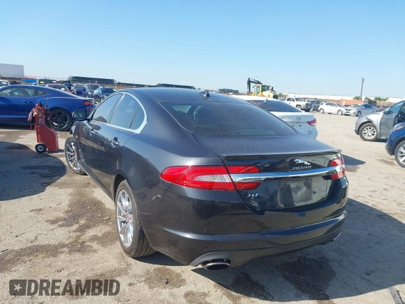 2015 Jaguar XF T Premium with VIN SAJWA0FS0FPU43248, listed as a IAAI auction lot 41977730 with 105,086 mi miles and . Bid and sale history available at DreamBid. Image 3.