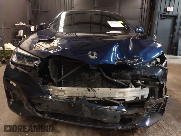 2022 BMW X6 M50i z VIN 5UXCY8C05N9J70601, wystawiony jako IAAI lot #42344397 z przebiegiem 49 085 mil mil oraz . Historia ofert i sprzedaży dostępna na DreamBid. Obrazek 6.