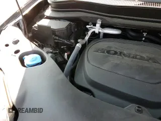 2020 Honda Pilot Touring 8-Passenger z VIN 5FNYF6H92LB012101, wystawiony jako Copart lot #71325235 z przebiegiem 11 891 mil mil oraz Szkoda całkowita • Salvage title. Historia ofert i sprzedaży dostępna na DreamBid. Obrazek 16.