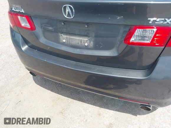 2010 Acura TSX with VIN JH4CU2F67AC015456, listed as a IAAI auction lot 42583419 with 220,012 mi miles and . Bid and sale history available at DreamBid. Image 6.