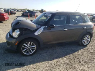 2012 MINI Countryman with VIN WMWZB3C58CWM03815, listed as a Copart auction lot 50097405 with 84,137 mi miles and Salvage Title. Bid and sale history available at DreamBid. Image 1.