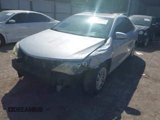 2014 Toyota Camry L with VIN 4T4BF1FK0ER421918, listed as a IAAI auction lot 42027646 with 152,088 mi miles and . Bid and sale history available at DreamBid. Image 2.