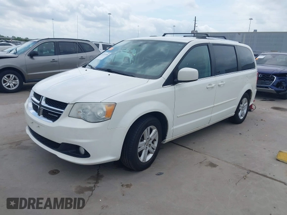 2011 Dodge Grand Caravan Crew with VIN 2D4RN5DGXBR786592, listed as a IAAI auction lot 42114198 with 243,423 mi miles and . Bid and sale history available at DreamBid. Image 19.