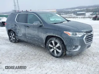 2021 Chevrolet Traverse LT Leather with VIN 1GNEVHKW8MJ140957, listed as a IAAI auction lot 41632635 with 57,848 mi miles. Bid and sale history available at carsss.com. Image 1.