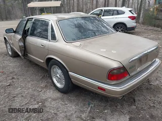 1997 Jaguar XJ with VIN SAJHX1245VC788530, listed as a IAAI auction lot 41768247 with 215,807 mi miles and . Bid and sale history available at DreamBid. Image 3.