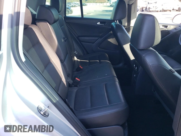 2012 Volkswagen Tiguan LE with VIN WVGAV7AX2CW580035, listed as a Copart auction lot 47297205 with 118,211 mi miles and Salvage title. Bid and sale history available at DreamBid. Image 10.