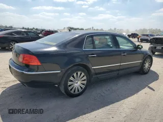 2005 Volkswagen Phaeton z VIN WVWAF03D658003589, wystawiony jako Copart lot #74049134 z przebiegiem 124 506 mil mil oraz Tytuł czysty. Historia ofert i sprzedaży dostępna na DreamBid. Obrazek 3.