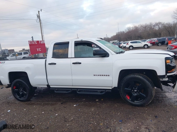 2018 Chevrolet Silverado 1500 LT with VIN 1GCVKREC9JZ119203, listed as a IAAI auction lot 41187466 with 129,125 mi miles. Bid and sale history available at carsss.com. Image 13.