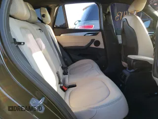 2018 BMW X1 xDrive28i with VIN WBXHT3C37J5K27694, listed as a Copart auction lot 64022772 with 59,413 mi miles. Bid and sale history available at carsss.com. Image 6.
