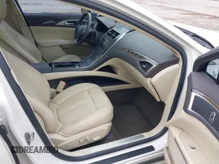 2013 Lincoln MKZ z VIN 3LN6L2GK9DR811737, wystawiony jako IAAI lot #42011896 z przebiegiem 100 669 mil mil oraz . Historia ofert i sprzedaży dostępna na DreamBid. Obrazek 5.