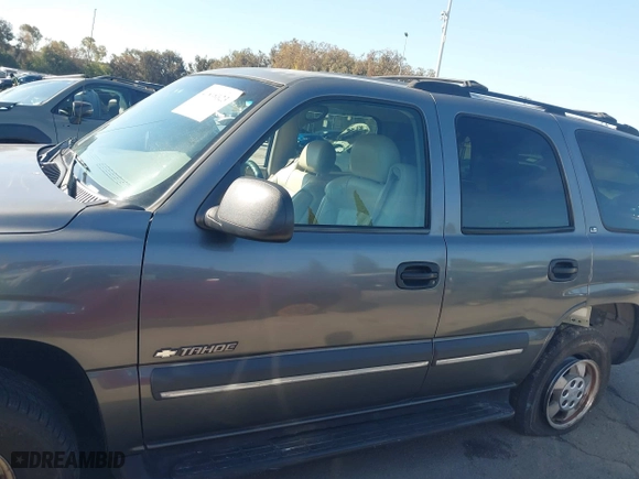 2002 Chevrolet Tahoe LT with VIN 1GNEC13ZX2R224413, listed as a IAAI auction lot 41818623 with 157,509 mi miles. Bid and sale history available at carsss.com. Image 14.