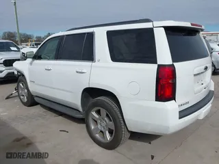 2018 Chevrolet Tahoe LT with VIN 1GNSCBKC0JR193421, listed as a IAAI auction lot 41241454 with 115,663 mi miles. Bid and sale history available at carsss.com. Image 3.