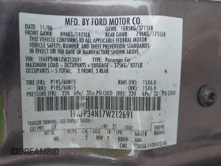 2007 Ford Focus S with VIN 1FAFP34N17W212691, listed as a IAAI auction lot 42130099 with 214,101 mi miles and . Bid and sale history available at carsss.com. Image 9.