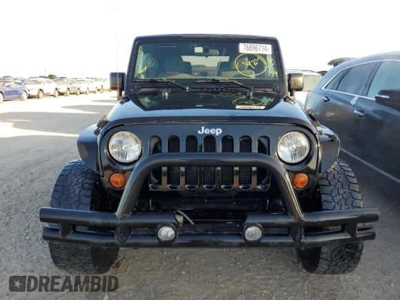 2011 Jeep Wrangler Rubicon с VIN 1J4BA6D17BL544602, выставлен на аукционе Copart как лот 76896714 с пробегом Не указан миль и На запчасти • Non repairable. История ставок и продаж доступна на DreamBid. Изображение 5.
