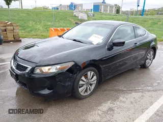 2009 Honda Accord LX-S with VIN 1HGCS12339A010440, listed as a IAAI auction lot 42045025 with 126,767 mi miles and . Bid and sale history available at DreamBid. Image 2.