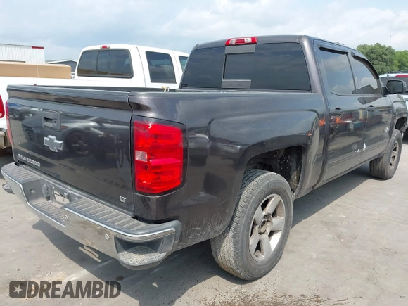 2015 Chevrolet Silverado 1500 LT with VIN 3GCPCREC7FG411610, listed as a IAAI auction lot 41975360 with 243,335 mi miles and . Bid and sale history available at DreamBid. Image 4.