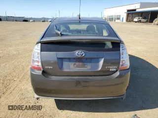 2007 Toyota Prius z VIN JTDKB20U573288978, wystawiony jako Copart lot #57469155 z przebiegiem 170 422 mil mil oraz Szkoda całkowita • Salvage title. Historia ofert i sprzedaży dostępna na DreamBid. Obrazek 6.