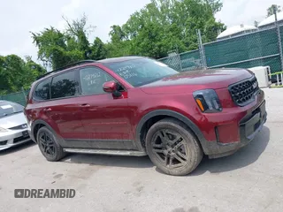 2024 Kia Telluride EX X-Line z VIN 5XYP3DGC6RG435643, wystawiony jako IAAI lot #42279212 z przebiegiem 10 069 mil mil oraz . Historia ofert i sprzedaży dostępna na DreamBid. Obrazek 13.