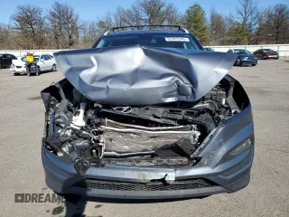 2017 Hyundai Tucson SE z VIN KM8J33A44HU376246, wystawiony jako Copart lot #52453345 z przebiegiem 97 306 mil mil oraz Szkody całkowita. Historia ofert i sprzedaży dostępna na DreamBid. Obrazek 5.
