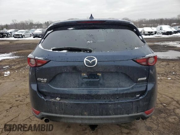 2019 Mazda CX-5 Grand Touring with VIN JM3KFBDM6K0667925, listed as a Copart auction lot 44657565 with 71,359 mi miles and Salvage Title. Bid and sale history available at carsss.com. Image 6.