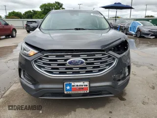 2019 Ford Edge SEL z VIN 2FMPK4J92KBB21770, wystawiony jako Copart lot #56056585 z przebiegiem 64 042 mil mil oraz Szkoda całkowita • Salvage title. Historia ofert i sprzedaży dostępna na DreamBid. Obrazek 5.