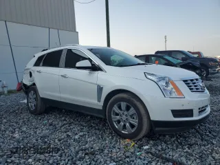 2014 Cadillac SRX Luxury Collection z VIN 3GYFNBE39ES567196, wystawiony jako Copart lot #55326075 z przebiegiem 98 942 mil mil oraz Szkody całkowita. Historia ofert i sprzedaży dostępna na DreamBid. Obrazek 4.