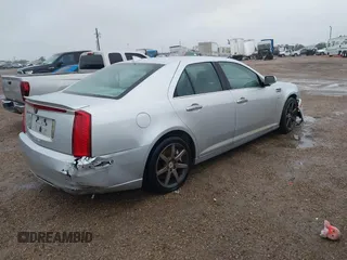 2010 Cadillac STS AWD z VIN 1G6DU6EV4A0114410, wystawiony jako IAAI lot #41301240 z przebiegiem 120 023 mil mil oraz . Historia ofert i sprzedaży dostępna na DreamBid. Obrazek 4.