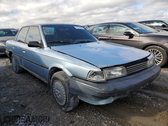 1990 Toyota Camry DLX z VIN 4T1SV21E8LU165609, wystawiony jako Copart lot #79314534 z przebiegiem 153 006 mil mil oraz Szkoda całkowita • Salvage title. Historia ofert i sprzedaży dostępna na DreamBid. Obrazek 4.