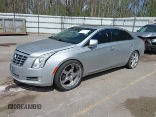 2013 Cadillac XTS Luxury z VIN 2G61P5S3XD9178601, wystawiony jako IAAI lot #42154859 z przebiegiem 111 227 mil mil oraz . Historia ofert i sprzedaży dostępna na DreamBid. Obrazek 2.