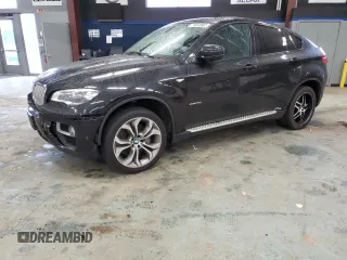2014 BMW X6 50i z VIN 5UXFG8C59EL593003, wystawiony jako Copart lot #52787043 z przebiegiem 78 936 mil mil oraz Czysty tytuł • Clean title. Historia ofert i sprzedaży dostępna na DreamBid. Obrazek 1.