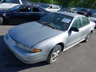 2004 Oldsmobile Alero GL1 z VIN 1G3NL52E54C196878, wystawiony jako IAAI lot #42357662 z przebiegiem Nie podano mil oraz . Historia ofert i sprzedaży dostępna na DreamBid. Obrazek 2.