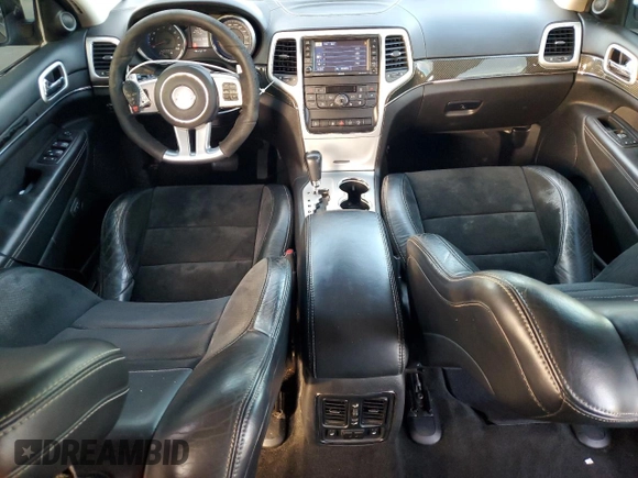 2012 Jeep Grand Cherokee SRT8 with VIN 1C4RJFDJ9CC346867, listed as a Copart auction lot 86349154 with 125,130 mi miles and Salvage Title. Bid and sale history available at carsss.com. Image 8.