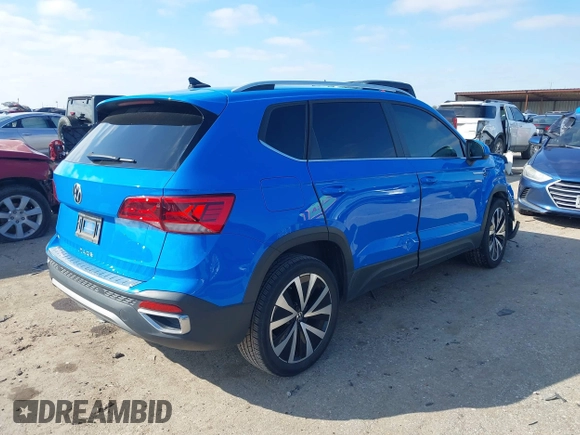 2022 Volkswagen Taos SE z VIN 3VVRX7B28NM088778, wystawiony jako IAAI lot #41624907 z przebiegiem 32 903 mil mil oraz . Historia ofert i sprzedaży dostępna na DreamBid. Obrazek 4.