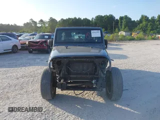 2014 Jeep Wrangler Unlimited Sport with VIN 1C4BJWDG5EL327225, listed as a IAAI auction lot 42547991 with 129,545 mi miles and . Bid and sale history available at DreamBid. Image 12.