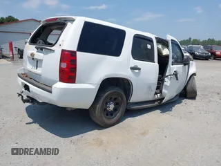2013 Chevrolet Tahoe Commercial with VIN 1GNLC2E08DR216213, listed as a IAAI auction lot 37406061 with Not provided miles and . Bid and sale history available at DreamBid. Image 4.
