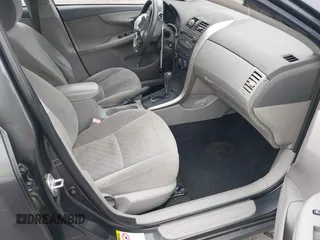 2009 Toyota Corolla with VIN JTDBL40E899066243, listed as a IAAI auction lot 41884292 with 219,338 mi miles. Bid and sale history available at carsss.com. Image 5.
