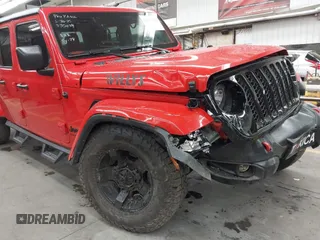 2022 Jeep Gladiator Altitude z VIN 1C6HJTAGXNL117353, wystawiony jako IAAI lot #42427921 z przebiegiem 28 801 mil mil oraz . Historia ofert i sprzedaży dostępna na DreamBid. Obrazek 6.