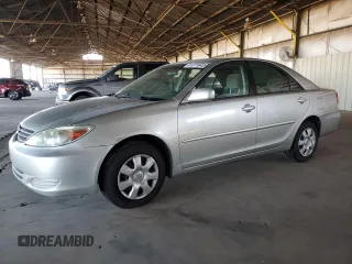 2004 Toyota Camry LE z VIN JTDBE32K440249742, wystawiony jako Copart lot #61271645 z przebiegiem 266 717 mil mil oraz Czysty tytuł • Clean title. Historia ofert i sprzedaży dostępna na DreamBid. Obrazek 1.