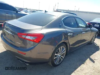2015 Maserati Ghibli z VIN ZAM57XSA6F1153481, wystawiony jako IAAI lot #41694942 z przebiegiem 74 027 mil mil oraz . Historia ofert i sprzedaży dostępna na DreamBid. Obrazek 4.