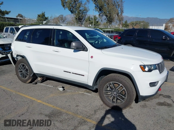 2017 Jeep Grand Cherokee Trailhawk with VIN 1C4RJFLGXHC959092, listed as a IAAI auction lot 41232281 with 108,659 mi miles and . Bid and sale history available at DreamBid. Image 1.