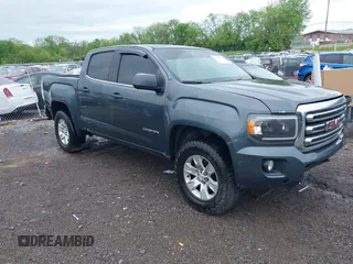 2015 GMC Canyon 4WD SLE with VIN 1GTG6BE3XF1153421, listed as a IAAI auction lot 42079375 with 161,379 mi miles and . Bid and sale history available at carsss.com. Image 1.