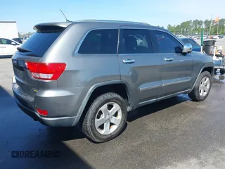 2012 Jeep Grand Cherokee Limited with VIN 1C4RJEBG1CC258123, listed as a IAAI auction lot 42065345 with 168,852 mi miles. Bid and sale history available at carsss.com. Image 4.