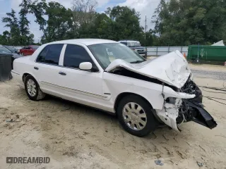 2006 Mercury Grand Marquis LS Premium with VIN 2MEHM75W26X619883, listed as a Copart auction lot 71742044 with 101,426 mi miles and Salvage Title. Bid and sale history available at carsss.com. Image 4.
